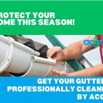 Person cleaning a white house gutter with tools; promoting professional gutter cleaning by ACGM.